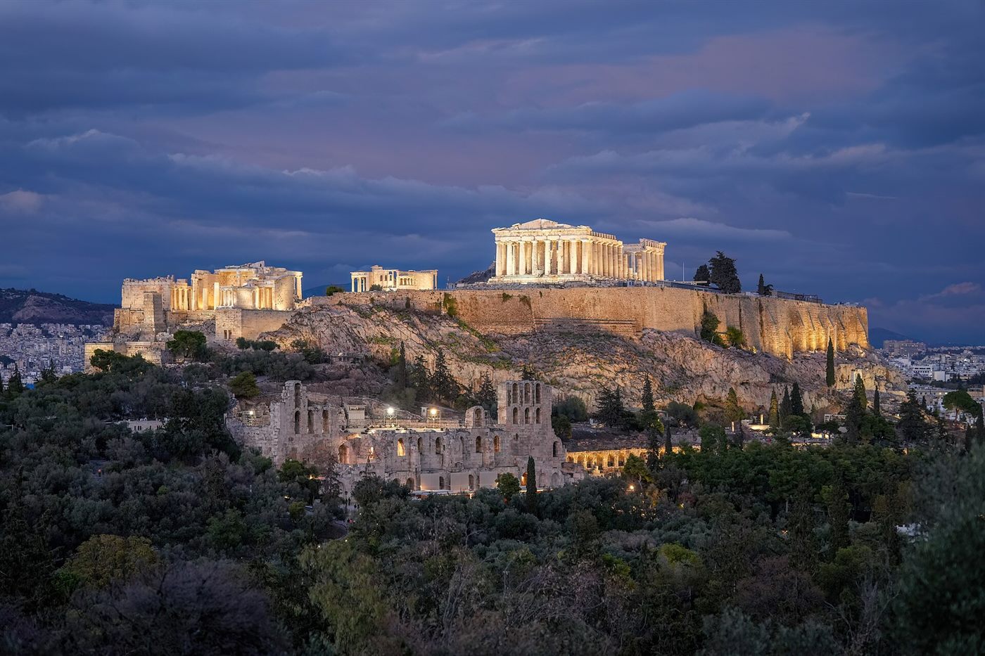 Aegean hillside with a classical colonnade and white modern residences
